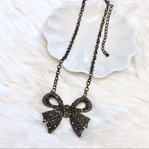 Sweetheart bow rhinestone metal statement necklace